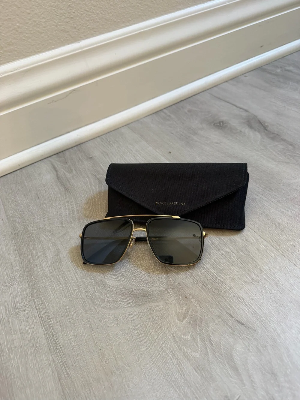 Dolce & Gabbana Black and Gold polarized Sunglasses with Case